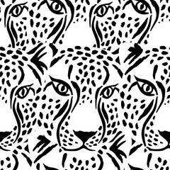 pattern seamless with leopard print and leopard heads