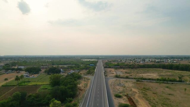 DRONE | 4k | 60 FPS 

Aerial view of a 4-lane highway in India.  
Shot from a drone, this is a 4-lane highway connecting the cities of Hyderabad and Bangalore. 