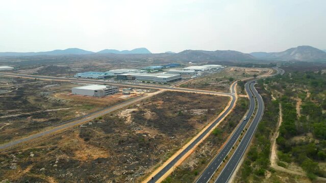 DRONE | 4k | 60 FPS 

Aerial view of a 4-lane highway in India.  
Shot from a drone, this is a 4-lane highway connecting the cities of Hyderabad and Bangalore. 