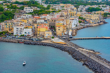 Seaside view of Porto d'Ischia town from the Aragonese castle at Ischia island, Italy
