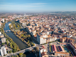 Aerial point of view of Valladolid city. View of River Pisuerga and Juan de Austria Bridge. At the...