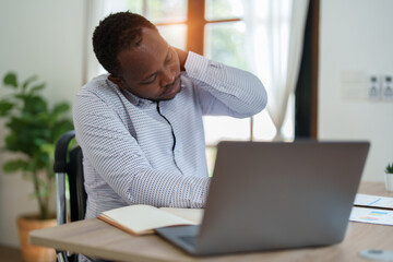 Burnout American African business man in stress works with many paperwork document, migraine attack, Freelance, work from home