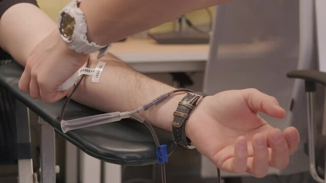 Blood Donation Process Close Up of Needle in Arm Medial Procedure