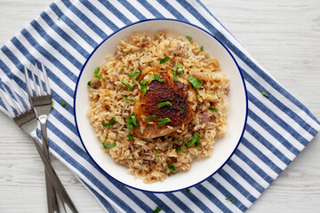 Homemade Paprika Chicken and Rice on a Plate, top view.