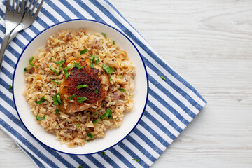 Homemade Paprika Chicken and Rice on a Plate, top view. Flat lay, overhead, from above. Copy space.