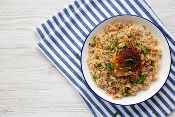 Homemade Paprika Chicken and Rice on a Plate, top view. Flat lay, overhead, from above. Copy space.