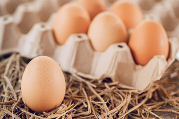 Chicken eggs on a straw for health