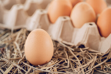 Chicken eggs on a straw for health