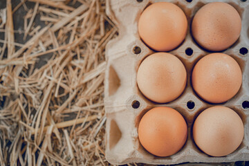 Chicken eggs on a straw for health