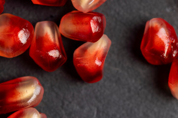 Red ripe pomegranate with red and juicy grains