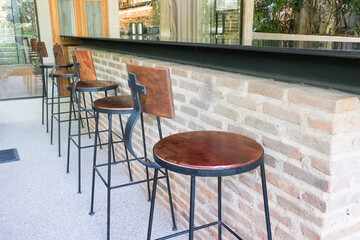 Circular metal table and chair at restaurant.