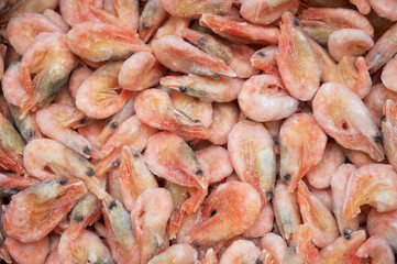 Frozen shrimp in fridge at the fish market. Healthy eating and fish market concept