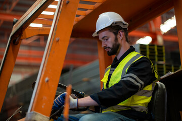 Male worker driving a forklift while falling asleep. dangerous while working © Duangporn