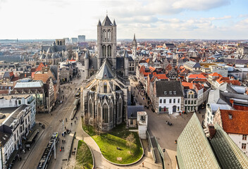 Fototapeta premium View from Belfort tower with St. Nicholas Church, Ghent, Belgium. March 2023