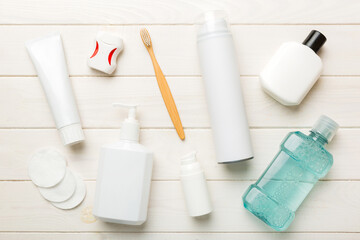 Naklejka premium Mockup for bathing products top view flat lay, spa razor, toothpaste, soap, gel and other various accessories. Cosmetics for skin health. Bath Mockup for your logo