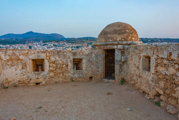Sunset view of Venetian Fortezza Castle in Greek town Rethimno, Crete