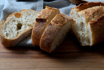 Slices of bread cut on a wooden board