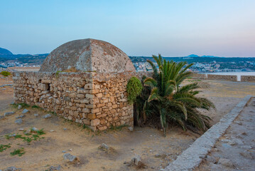 Sunset view of Venetian Fortezza Castle in Greek town Rethimno, Crete