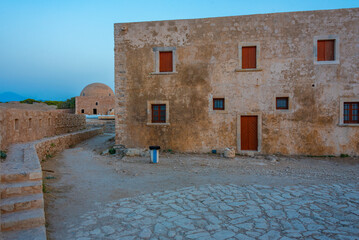Sunset view of Venetian Fortezza Castle in Greek town Rethimno, Crete