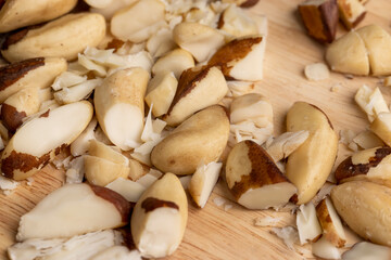 Fresh Brazil nuts peeled from the shell on the table