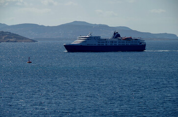 Fototapeta na wymiar Large modern Passenger freighter pax cargo roro ro-ro ferry cruiseship cruise ship liner at sea