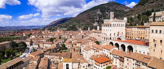 Poster Aerial drone panoramic view of medieval town Gubbio in Umbria.  Italy travel .great historical italian landmarks and best tourist destinations © Freesurf