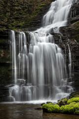 Beautiful British countryside waterfall in full flow; Scaleber Force, Yorkshire Dales National Park, UK.