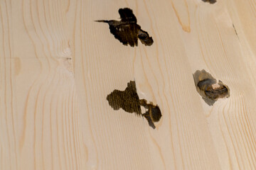 dirty pine board with black spots