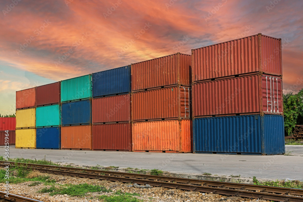 Wall mural Railway cargo containers with Twilight. 