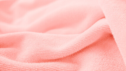 Soft pink towel. Pink Background.