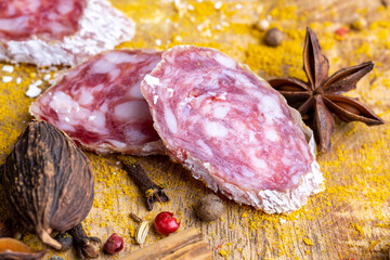 Dried veal sausage with white mold and spices