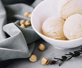 Delicious ice cream with hazelnut close up