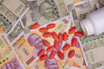 pills and money health care bills expense