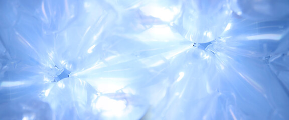 Cold blue foil or plastic transparent background.
