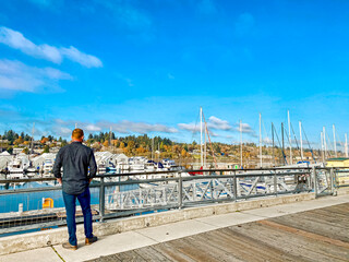 man on pier, olympia, washington
