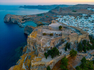 Sunset view of Saint Paul's beach and Acropolis at Greek town Lindos at Rhodes island