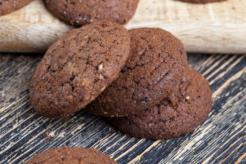 chocolate cookies on a wooden board