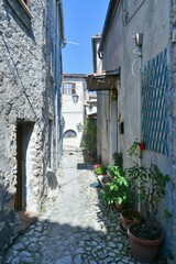 A narrow street among the old houses of Fumone, a historic town in the state of Lazio in Italy.