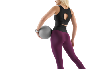 Fitness woman with medicine ball isolated. Cropped photo of muscular blonde young female athlete with a ball. Great fit slim figure turned her back to camera. 