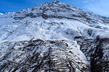 Mountain belly loaded with fresh snow