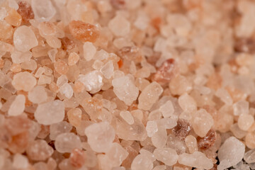 Fototapeta na wymiar Pink natural salt on the table, close up