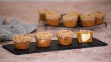 Healthy pumpkin muffins with cream cheese filling.
