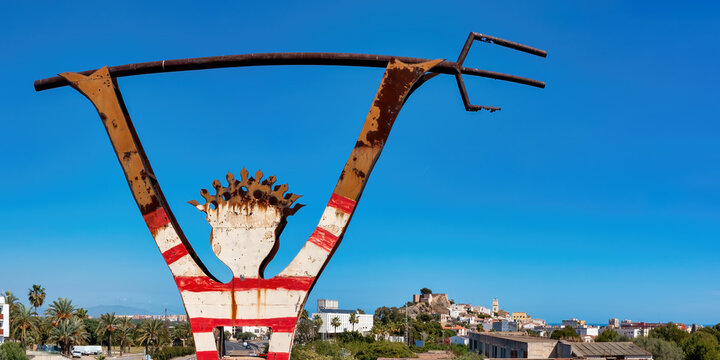 Abandoned Vintage Motel Sign with Oropesa del Mar in Background - Travel and Tourism Concept