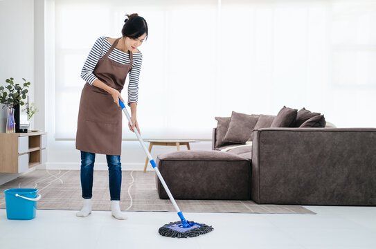 Clean tile floors with mops and floor cleaning products. 3320470 Stock  Photo at Vecteezy