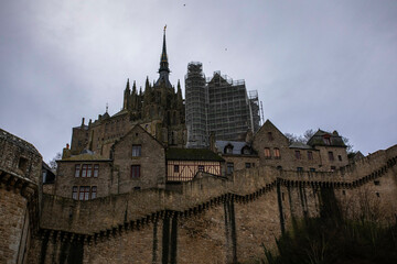 Mont Saint Michel in normandy, France during a cloudy day