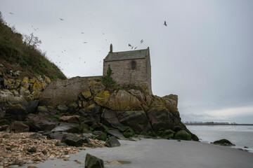 house behind Mont Saint Michel in normandy, France