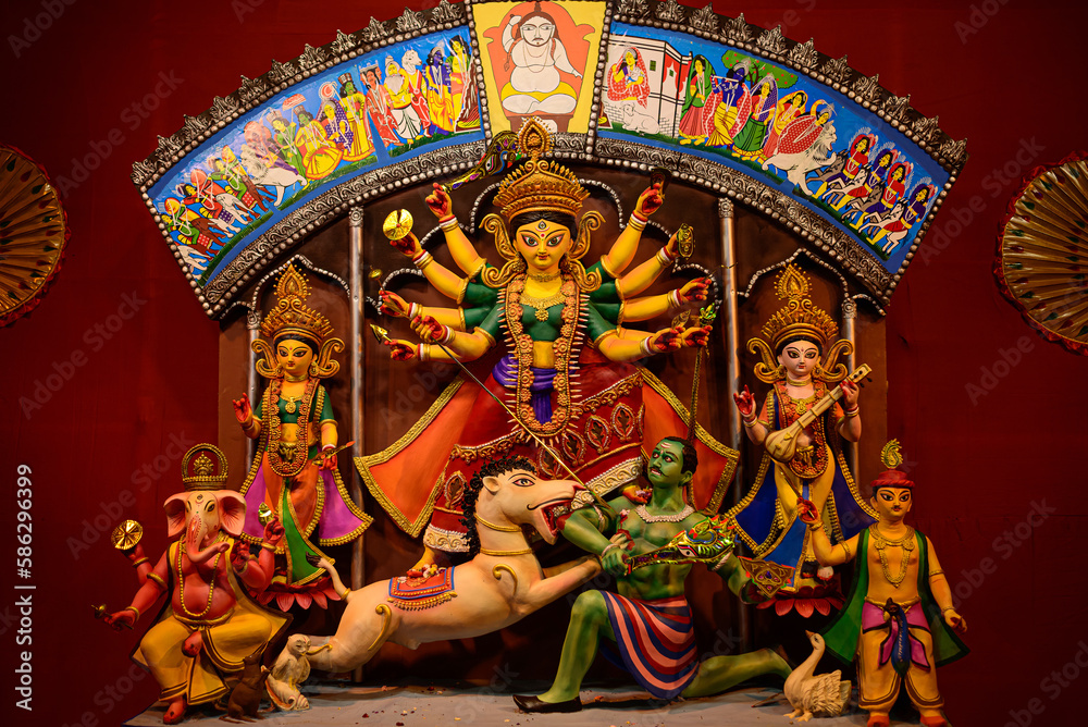 Wall mural idol of goddess devi durga at a decorated puja pandal in kolkata, west bengal, india. durga puja is 