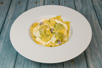 Recipe for Homemade Italian Ravioli pasta with Spinach and Ricotta Filling. High quality photo