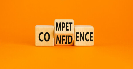 Competence and confidence symbol. Concept word Competence Confidence on wooden cubes. Beautiful...