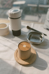 Close up of pressed espresso coffee on the table by the window.